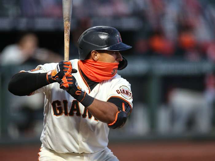 Donovan Solano stands ready to swing